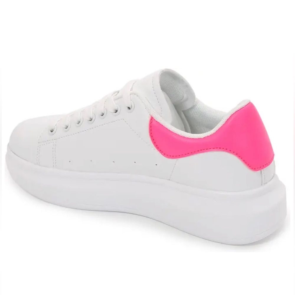 Pink and white sneakers